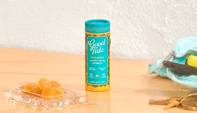 Good Tide Pineapple Gummies — solventless rosin gummies tube styled with real pineapple and tropical decor